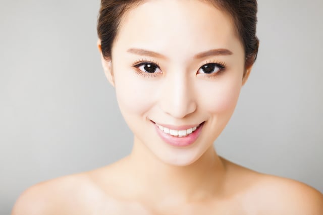 bigstock-Closeup-Smiling-Young-Asian-W-84454724.jpg
