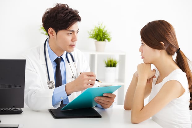 bigstock-Doctor-Talking-With-Female-Pat-85998143.jpg